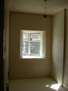 Plastered, with new, deeper, window sill.